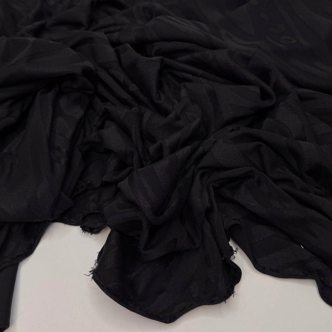 Pool Party Animal - Jersey Poly/Spandex Knit - Black Animal Print - 1.05M Bundle - True Deadstock fabric Fabric by private - Sustainable Textile | FABCYCLE