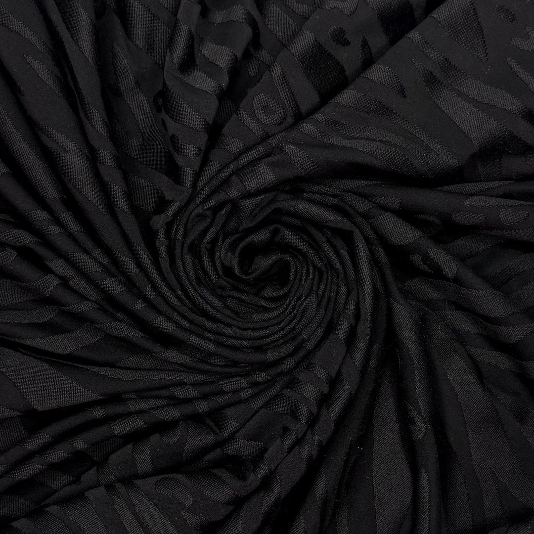 Pool Party Animal - Jersey Poly/Spandex Knit - Black Animal Print - 1.05M Bundle - True Deadstock fabric Fabric by private - Sustainable Textile | FABCYCLE