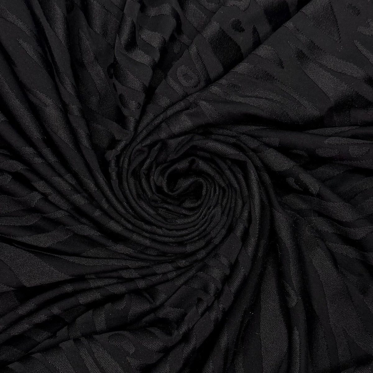 Pool Party Animal - Jersey Poly/Spandex Knit - Black Animal Print - 1.05M Bundle - True Deadstock fabric Fabric by private - Sustainable Textile | FABCYCLE