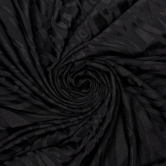 Pool Party Animal - Jersey Poly/Spandex Knit - Black Animal Print - 1.05M Bundle - True Deadstock fabric Fabric by private - Sustainable Textile | FABCYCLE