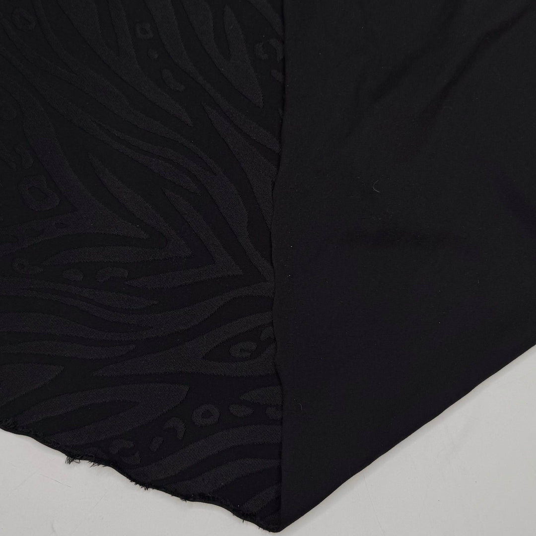 Pool Party Animal - Jersey Poly/Spandex Knit - Black Animal Print - 1.05M Bundle - True Deadstock fabric Fabric by private - Sustainable Textile | FABCYCLE