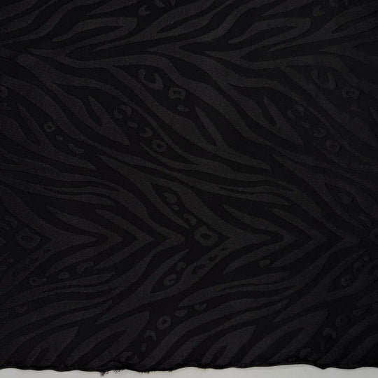 Pool Party Animal - Jersey Poly/Spandex Knit - Black Animal Print - 1.05M Bundle - True Deadstock fabric Fabric by private - Sustainable Textile | FABCYCLE