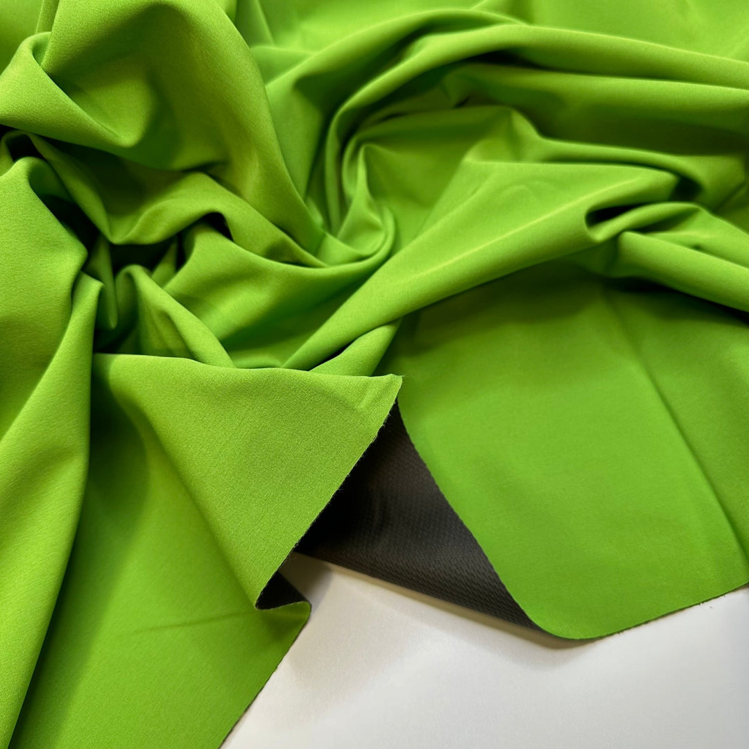 Practically A Dinosaur - Water Resistant Soft Shell Polyester Blend Knit - Green/Grey - 1M Bundle - True Deadstock fabric Fabric by private - Sustainable Textile | FABCYCLE