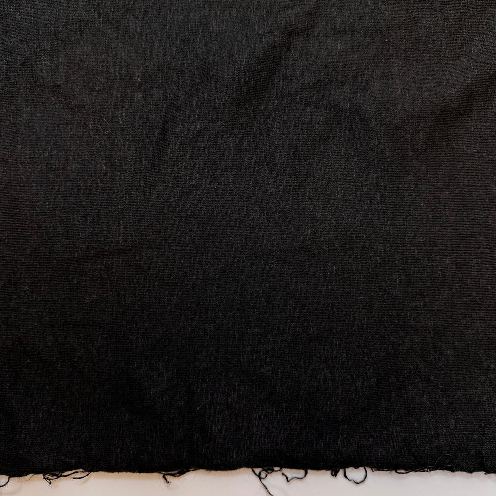 Put Differences Aside - Jersey Hemp Blend Knit - Black - 1.3M Bundle - True Deadstock fabric Fabric by private - Sustainable Textile | FABCYCLE