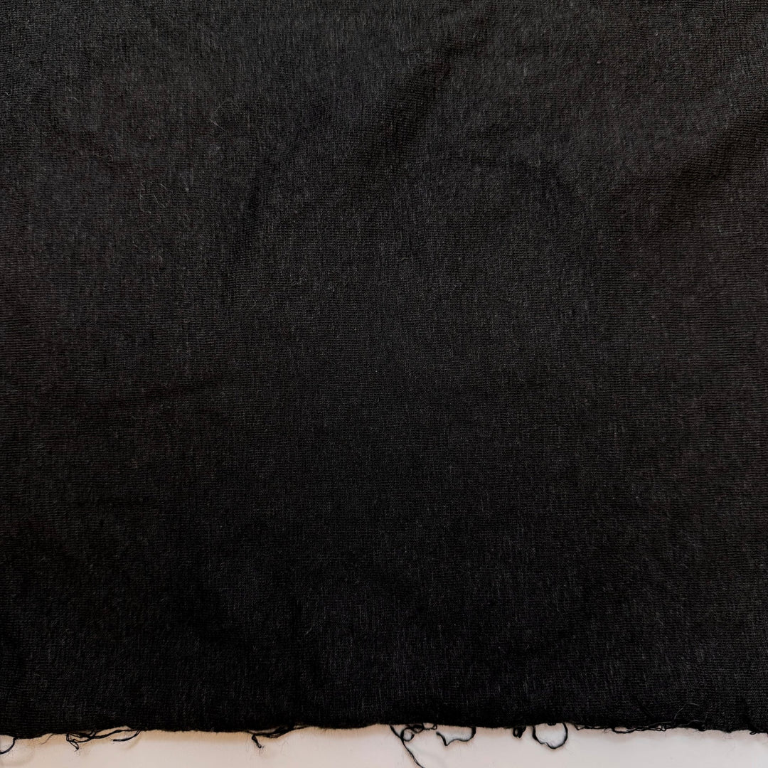 Put Differences Aside - Jersey Hemp Blend Knit - Black - 1.3M Bundle - True Deadstock fabric Fabric by private - Sustainable Textile | FABCYCLE