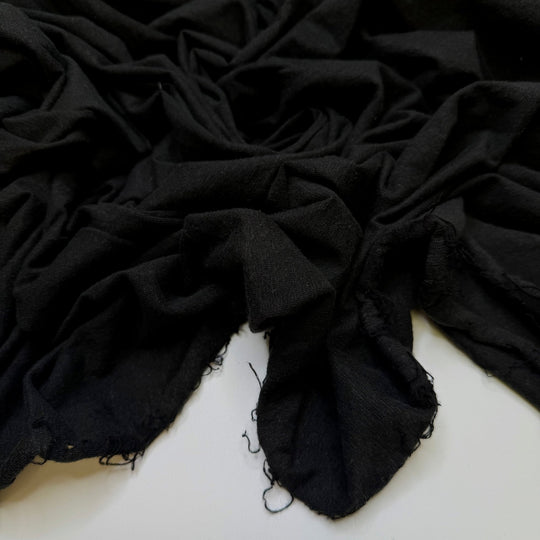 Put Differences Aside - Jersey Hemp Blend Knit - Black - 1.3M Bundle - True Deadstock fabric Fabric by private - Sustainable Textile | FABCYCLE