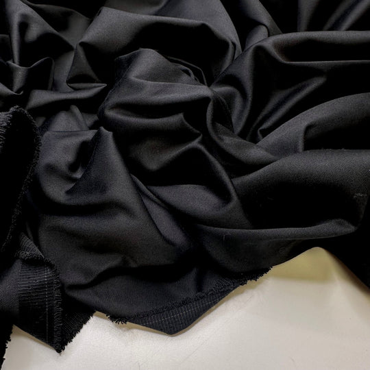 Quilting On My Lunch Break - Synthetic Blend Woven - Black - 1.9M Bundle - True Deadstock fabric Fabric by private - Sustainable Textile | FABCYCLE