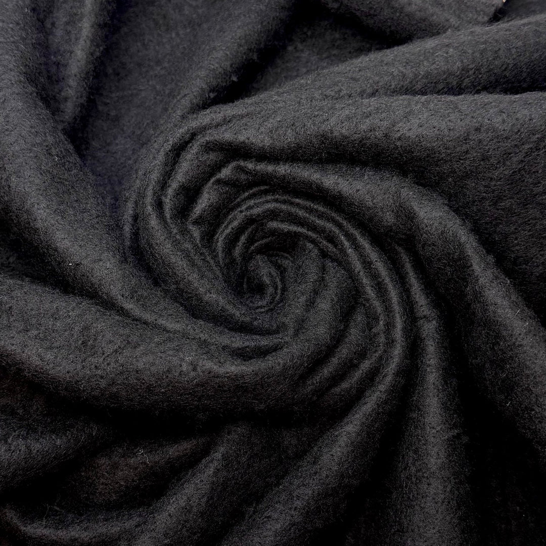 Raising Huskies - Felt Synthetic Woven - Black - 1.3M Bundle - True Deadstock fabric Fabric by private - Sustainable Textile | FABCYCLE