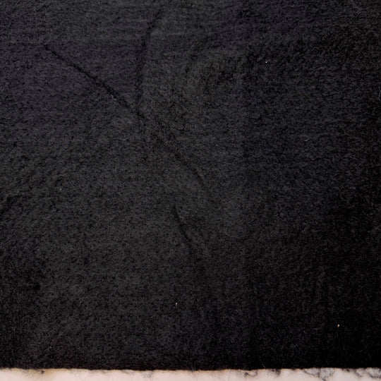 Raising Huskies - Felt Synthetic Woven - Black - 1.3M Bundle - True Deadstock fabric Fabric by private - Sustainable Textile | FABCYCLE