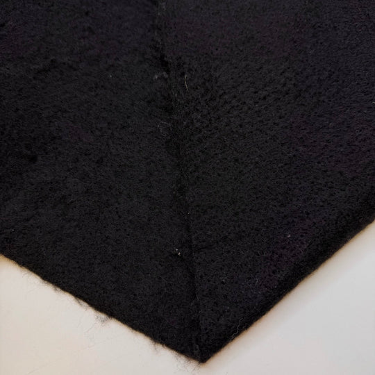 Raising Huskies - Felt Synthetic Woven - Black - 1.3M Bundle - True Deadstock fabric Fabric by private - Sustainable Textile | FABCYCLE
