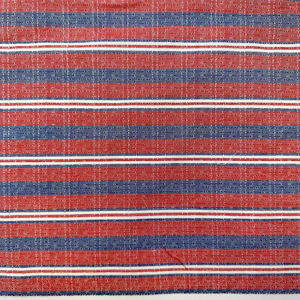 Reading A Book While Sunbathing - Poly/Cotton Woven - Red Multi Stripes - 1.15M Bundle - True Deadstock fabric Fabric by private - Sustainable Textile | FABCYCLE
