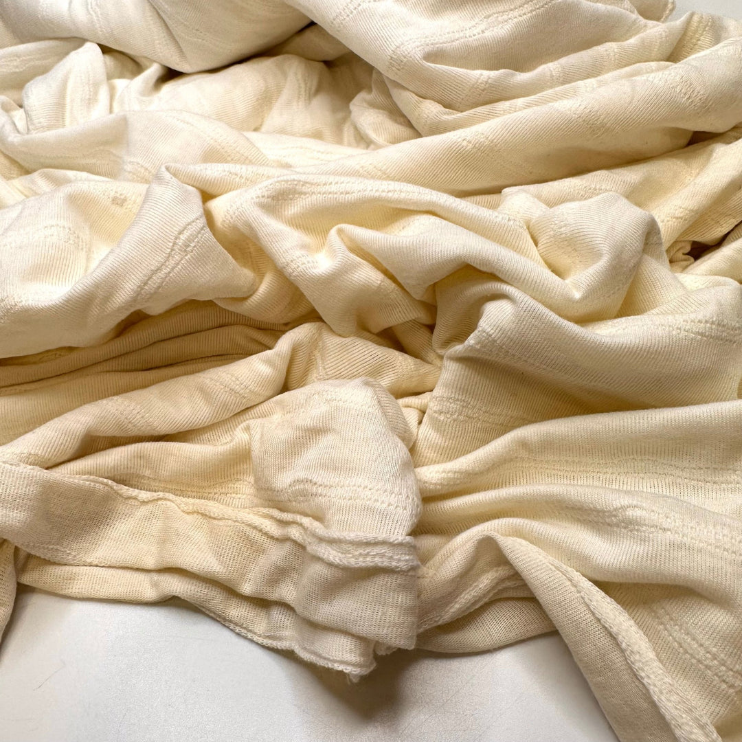 Ripples Through History - Tubular Poly/Cotton Knit - Cream - 3M Bundle - True Deadstock fabric Fabric by private - Sustainable Textile | FABCYCLE