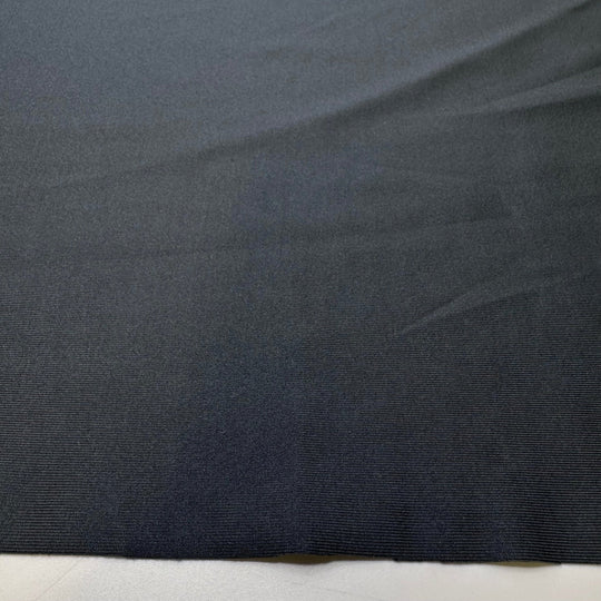 Running On New Asphalt - Poly/Spandex Knit - Dark Grey - 2.6M Bundle - True Deadstock fabric Fabric by private - Sustainable Textile | FABCYCLE