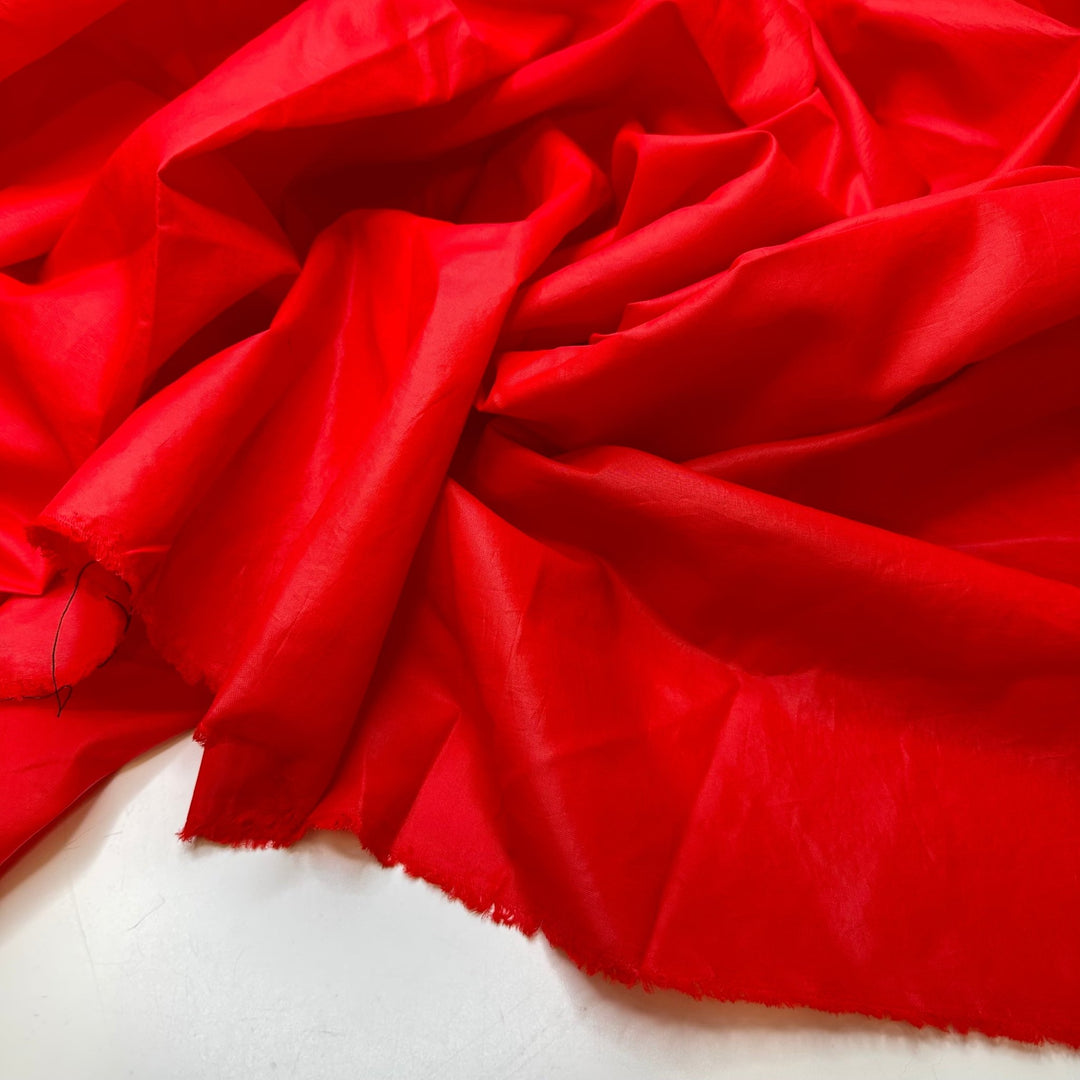 Santa Forgot His Raincoat - Water Resistant Polyester Blend Woven - Red - 1.6M Bundle - True Deadstock fabric Fabric by private - Sustainable Textile | FABCYCLE