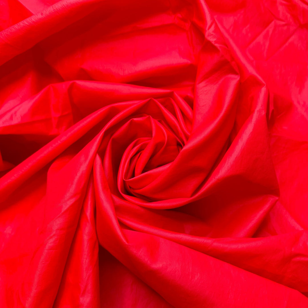 Santa Forgot His Raincoat - Water Resistant Polyester Blend Woven - Red - 1.6M Bundle - True Deadstock fabric Fabric by private - Sustainable Textile | FABCYCLE