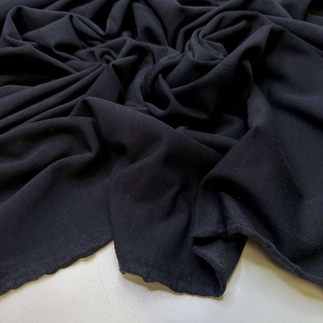 Serious Recovery Time - Polartec Jersey Fleece Polyester Blend Knit - Black - Bundles - True Deadstock fabric Fabric by private - Sustainable Textile | FABCYCLE