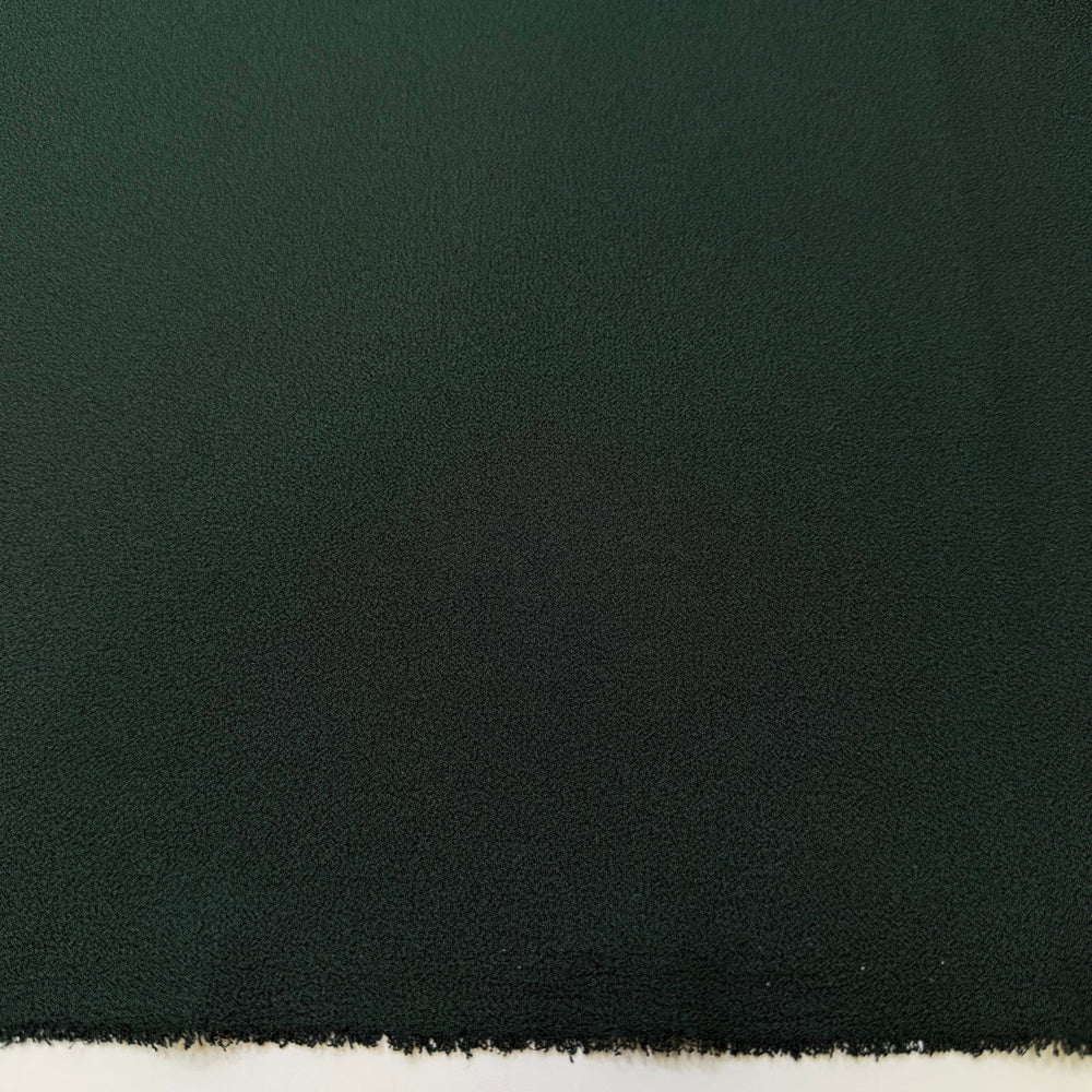 Setting Up The Christmas Tree - Crepe Poly Woven - Dark Green - 2M Bundle - True Deadstock fabric Fabric by private - Sustainable Textile | FABCYCLE