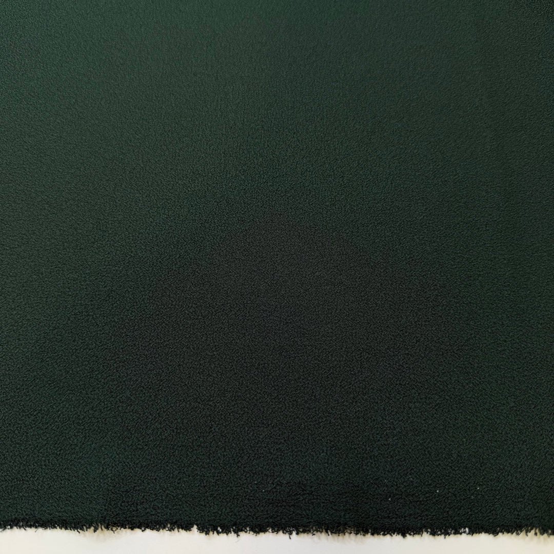 Setting Up The Christmas Tree - Crepe Poly Woven - Dark Green - 2M Bundle - True Deadstock fabric Fabric by private - Sustainable Textile | FABCYCLE