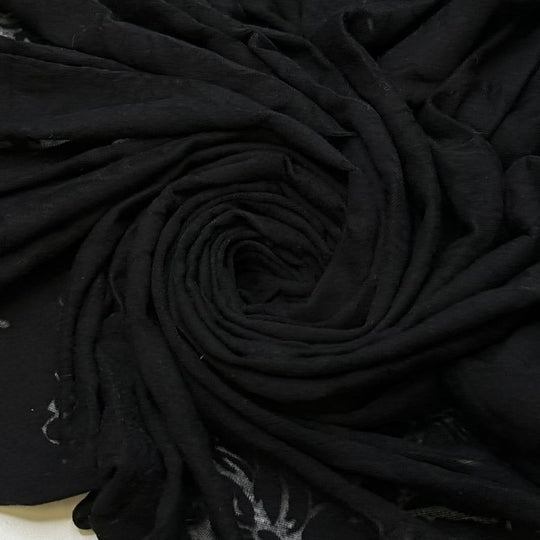 Shadows Of Flowers - Poly/Cotton Knit - Black Floral - 1.15M Bundle - True Deadstock fabric Fabric by private - Sustainable Textile | FABCYCLE