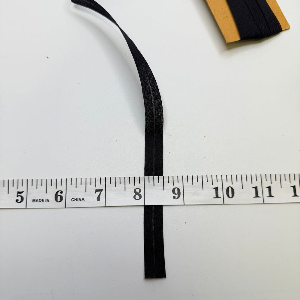 ½" Single Fold Woven Bias Tape - Black - 2M Bundle - True Deadstock supplies Fabric by private - Sustainable Textile | FABCYCLE