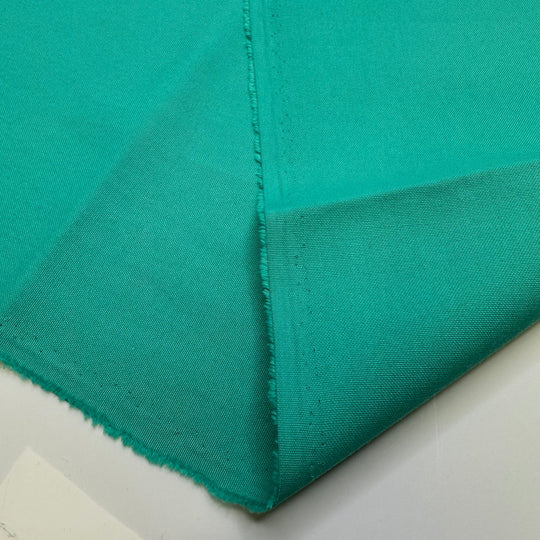 Sorbet Or Sherbet - Polyester Blend Woven - Beige/Teal - 3M Bundle - True Deadstock fabric Fabric by private - Sustainable Textile | FABCYCLE
