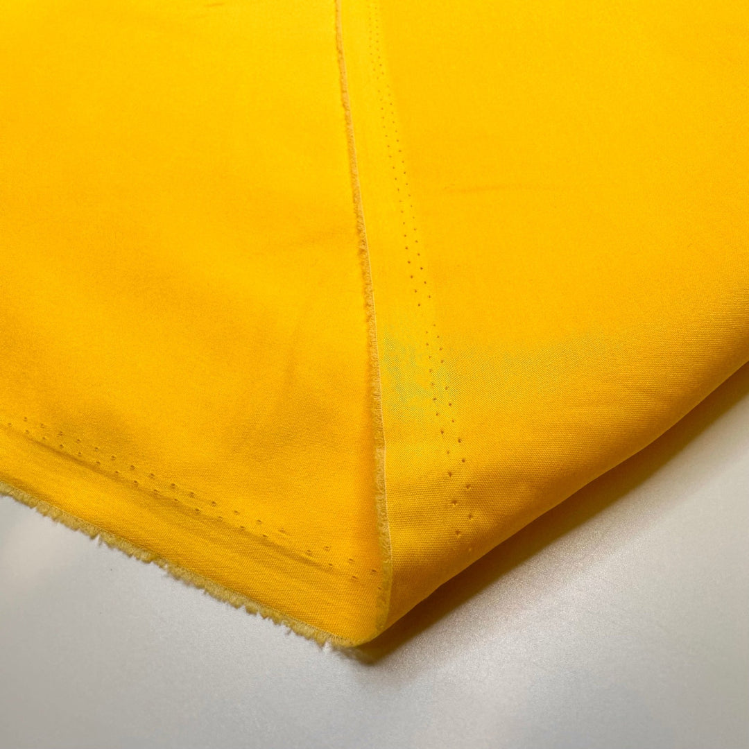 Staring At The Sun - Polyester Blend Woven - Yellow - 2M Bundle - True Deadstock fabric Fabric by private - Sustainable Textile | FABCYCLE