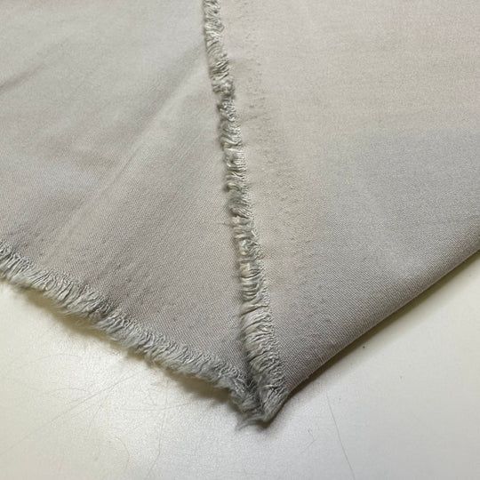 Stretch In Your Suit - Polyester Blend Woven - Light Grey - 1.25M Bundle - True Deadstock fabric Fabric by private - Sustainable Textile | FABCYCLE