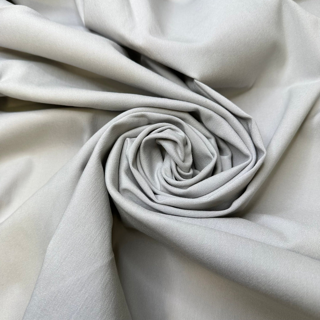Stretch In Your Suit - Polyester Blend Woven - Light Grey - 1.25M Bundle - True Deadstock fabric Fabric by private - Sustainable Textile | FABCYCLE