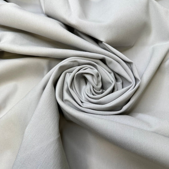 Stretch In Your Suit - Polyester Blend Woven - Light Grey - 1.25M Bundle - True Deadstock fabric Fabric by private - Sustainable Textile | FABCYCLE