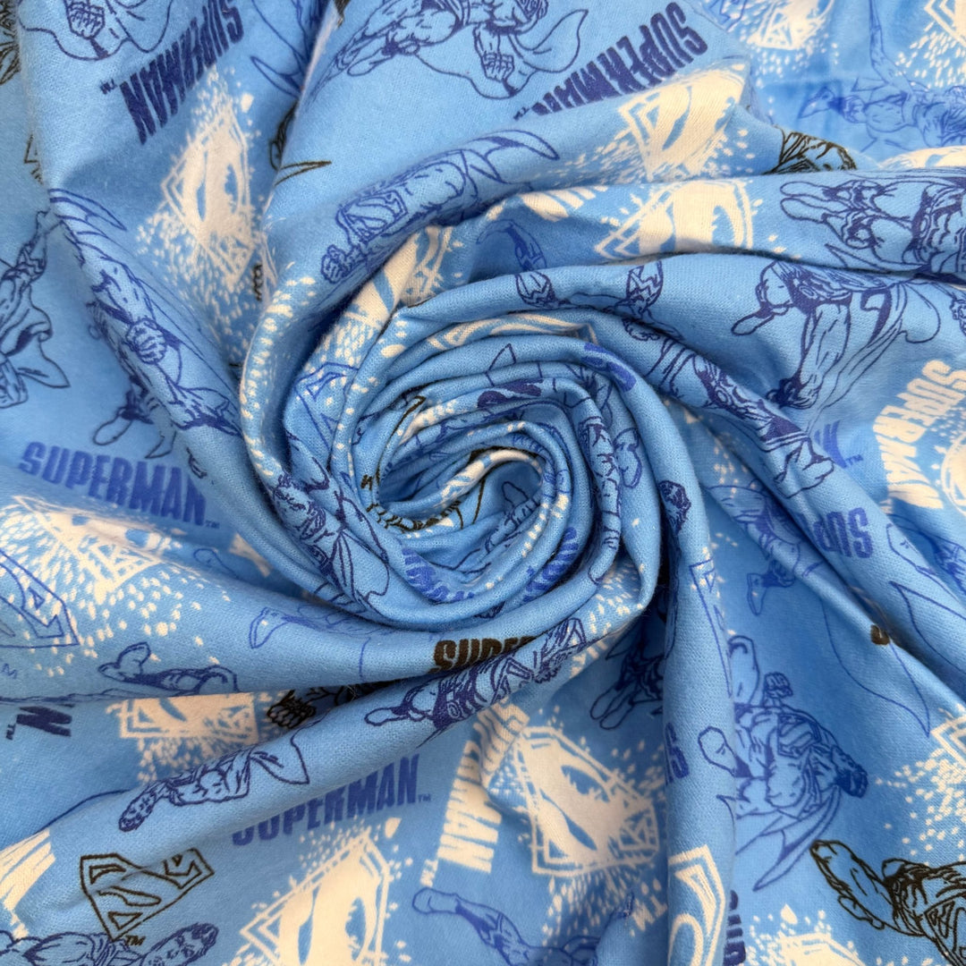 Super Quilter - Brushed Flanelette Cotton Woven - Light Blue Multi Superman - Bundles - True Deadstock fabric Fabric by private - Sustainable Textile | FABCYCLE