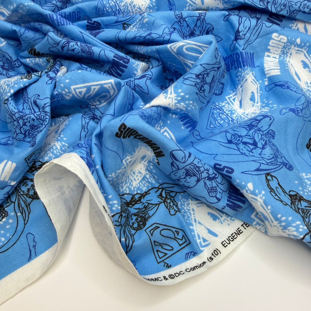 Super Quilter - Brushed Flanelette Cotton Woven - Light Blue Multi Superman - Bundles - True Deadstock fabric Fabric by private - Sustainable Textile | FABCYCLE