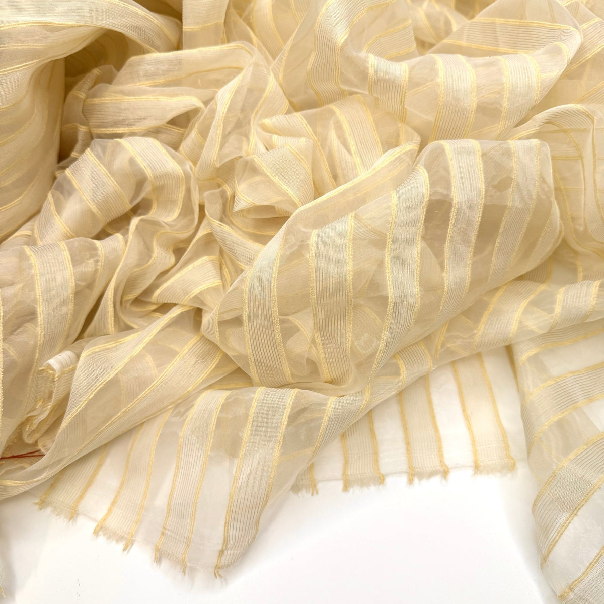 Surrounded By Cool Creations - Organza Polyester Blend Woven - Cream Stripes - 1.7M Bundle - True Deadstock fabric Fabric by private - Sustainable Textile | FABCYCLE