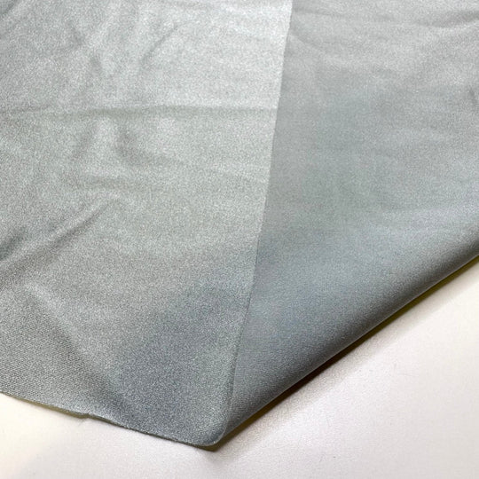 Swimming With Sting Rays - Jersey Poly/Spandex Knit - Silver - 1.85M Bundle - True Deadstock fabric Fabric by private - Sustainable Textile | FABCYCLE