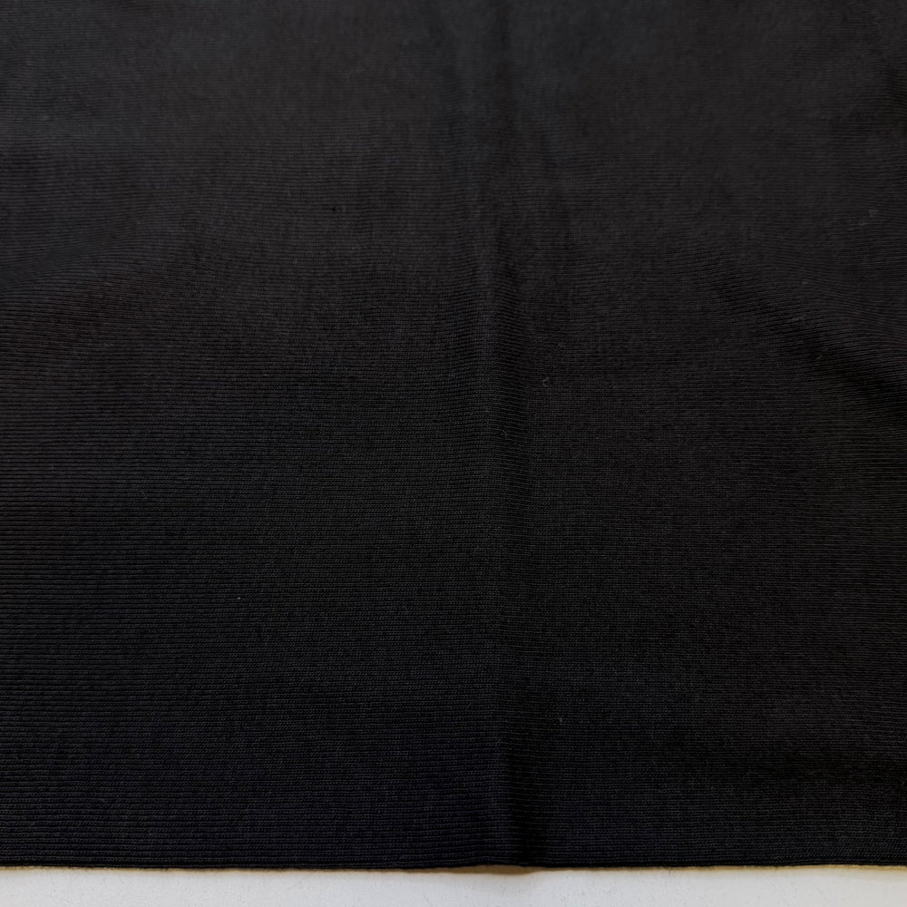 Taking Family Photos - Tubular Rib Knit Cotton Blend Knit - Black - 1.2M Bundle - True Deadstock fabric Fabric by private - Sustainable Textile | FABCYCLE