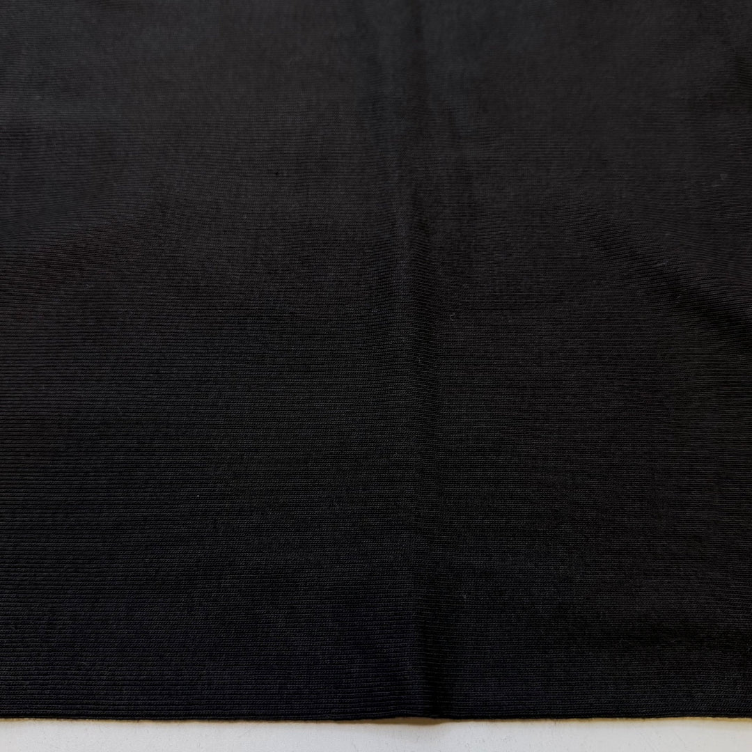 Taking Family Photos - Tubular Rib Knit Cotton Blend Knit - Black - 1.2M Bundle - True Deadstock fabric Fabric by private - Sustainable Textile | FABCYCLE