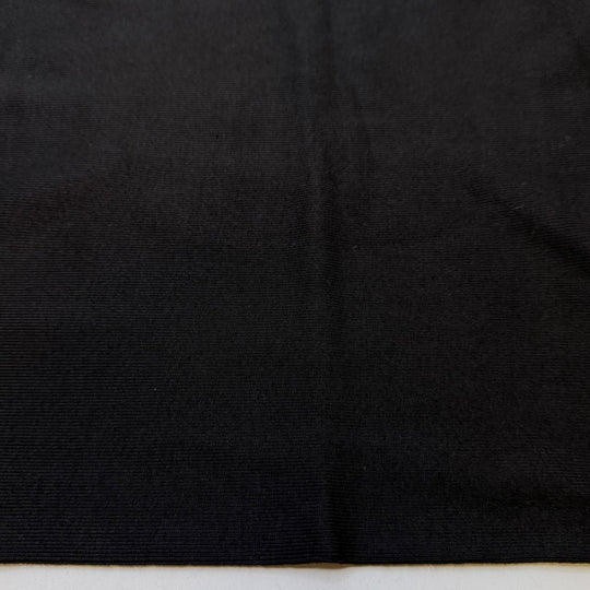 Taking Family Photos - Tubular Rib Knit Cotton Blend Knit - Black - 1.2M Bundle - True Deadstock fabric Fabric by private - Sustainable Textile | FABCYCLE