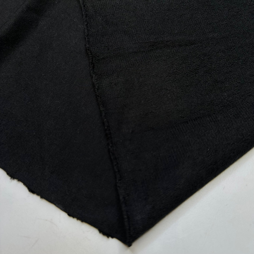 The Big Escape Scene - French Terry Cotton/Bamboo Knit - Black - 0.95M Bundle - True Deadstock fabric Fabric by private - Sustainable Textile | FABCYCLE