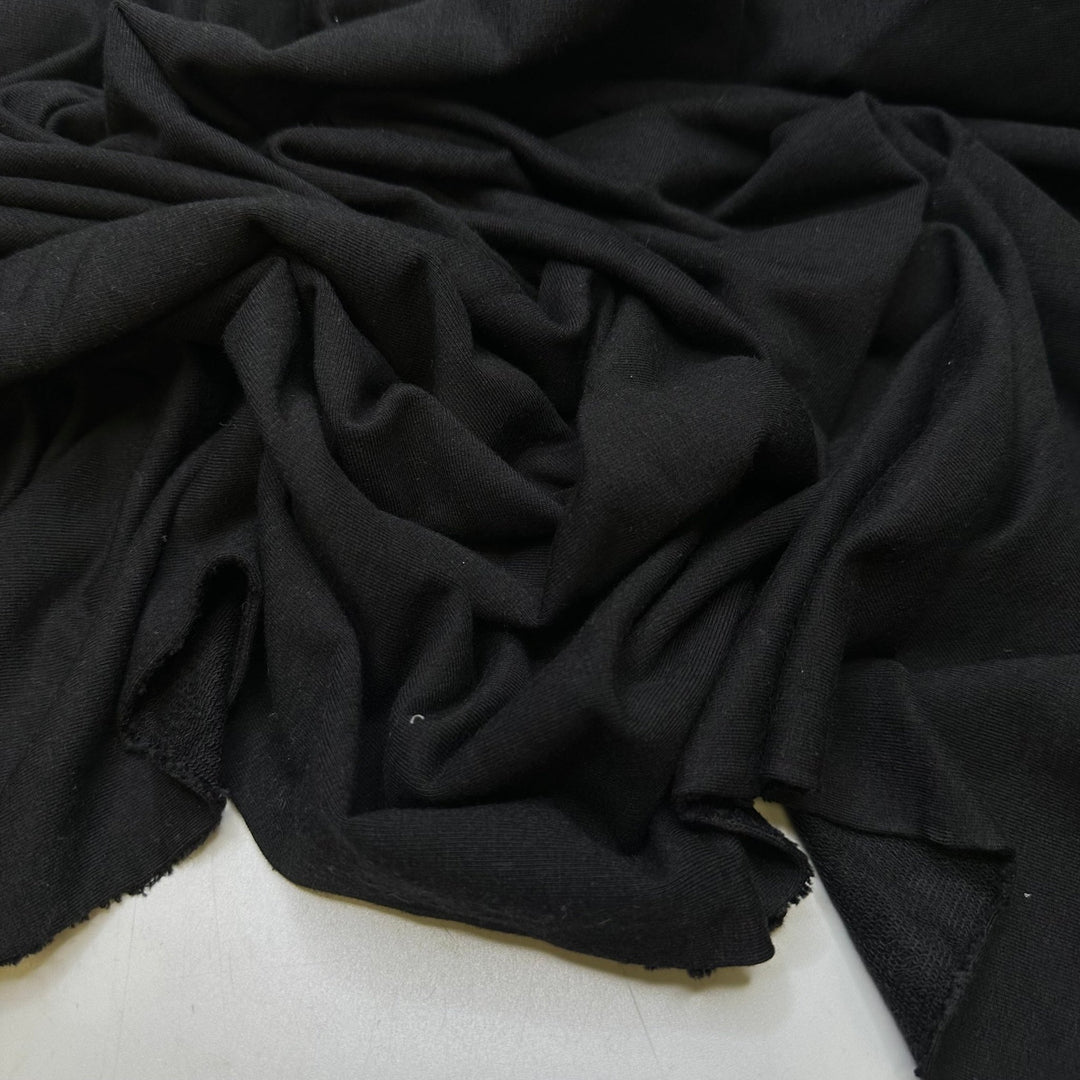 The Big Escape Scene - French Terry Cotton/Bamboo Knit - Black - 0.95M Bundle - True Deadstock fabric Fabric by private - Sustainable Textile | FABCYCLE