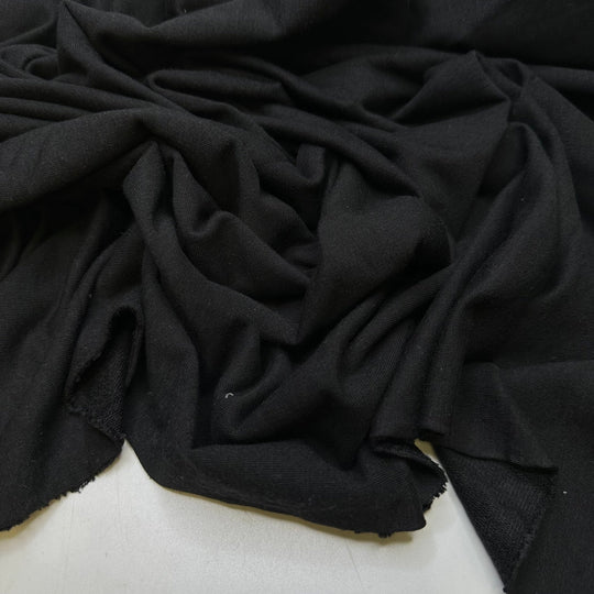 The Big Escape Scene - French Terry Cotton/Bamboo Knit - Black - 0.95M Bundle - True Deadstock fabric Fabric by private - Sustainable Textile | FABCYCLE