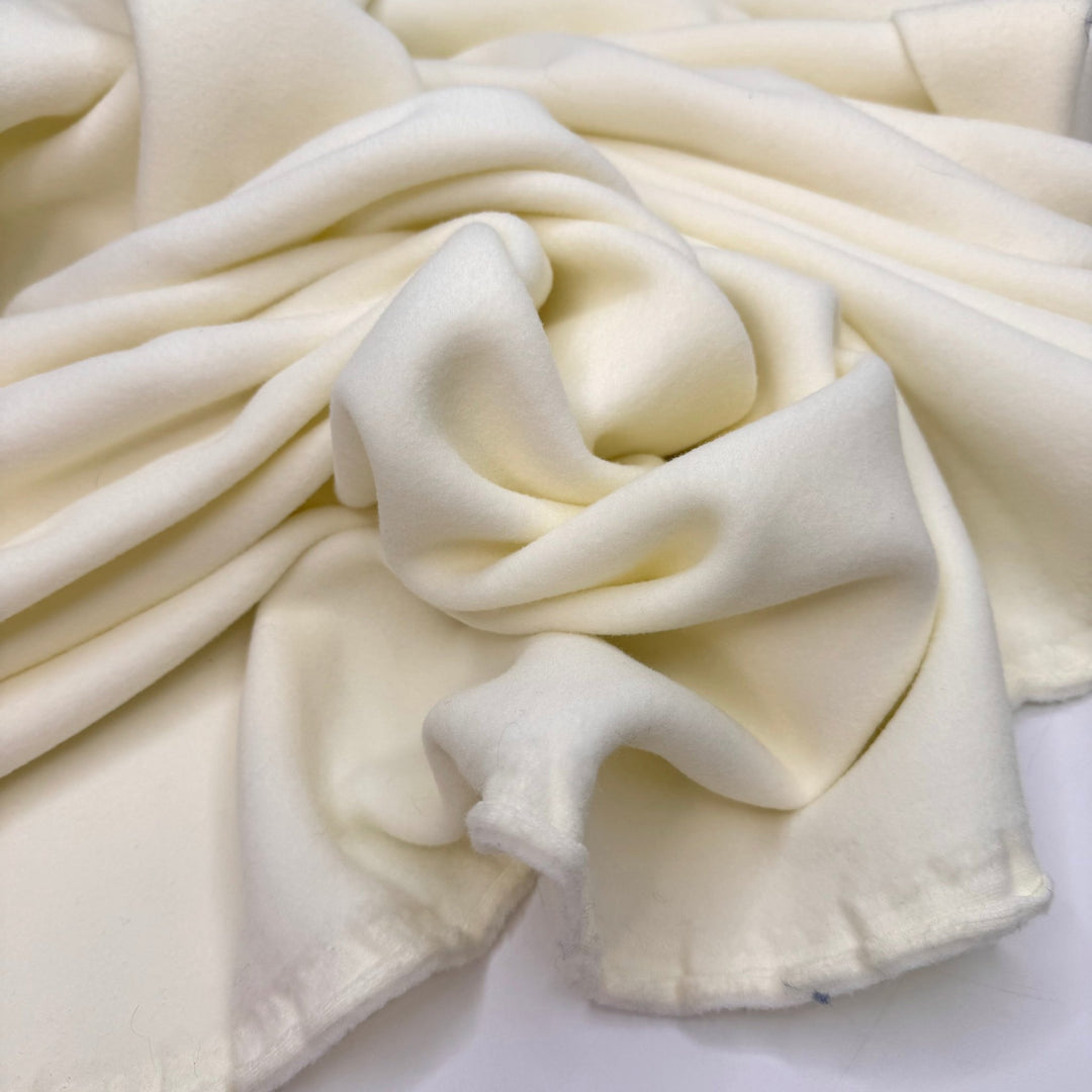 The Softest Camping Cot - Fleece Polyester Blend Knit - Light Cream - 2M Bundle - True Deadstock fabric Fabric by private - Sustainable Textile | FABCYCLE