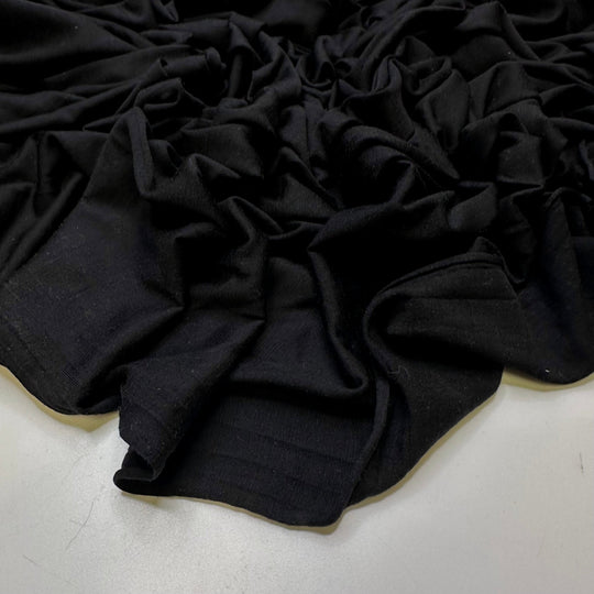 The Sun Goes Down Too Early Now - Jersey Wool Blend Knit - Black - 2.6M Bundle - True Deadstock fabric Fabric by private - Sustainable Textile | FABCYCLE