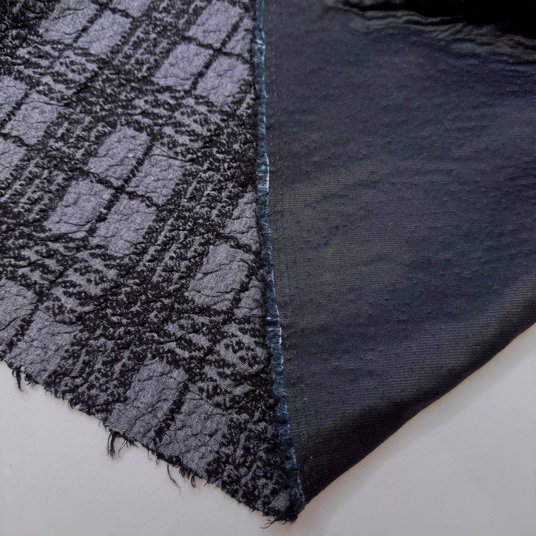 To The North Pole - Quilted Top Rib Knit Cotton Blend Knit - Grey/Black Plaid - 3.1M Bundle - True Deadstock fabric Fabric by private - Sustainable Textile | FABCYCLE