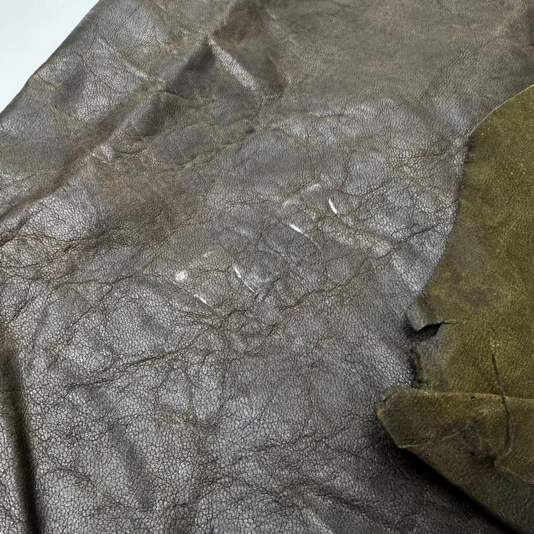 Turtle Turtle - Crinkle Leather Woven - Dark Green - 0.6M Bundle - True Deadstock fabric Fabric by private - Sustainable Textile | FABCYCLE