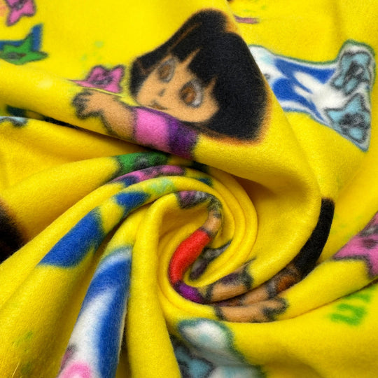UB - A - Dora - Ble - Fleece Poly Knit - Yellow Multi Dora The Explorer - 1.5M Bundle - True Deadstock fabric Fabric by private - Sustainable Textile | FABCYCLE