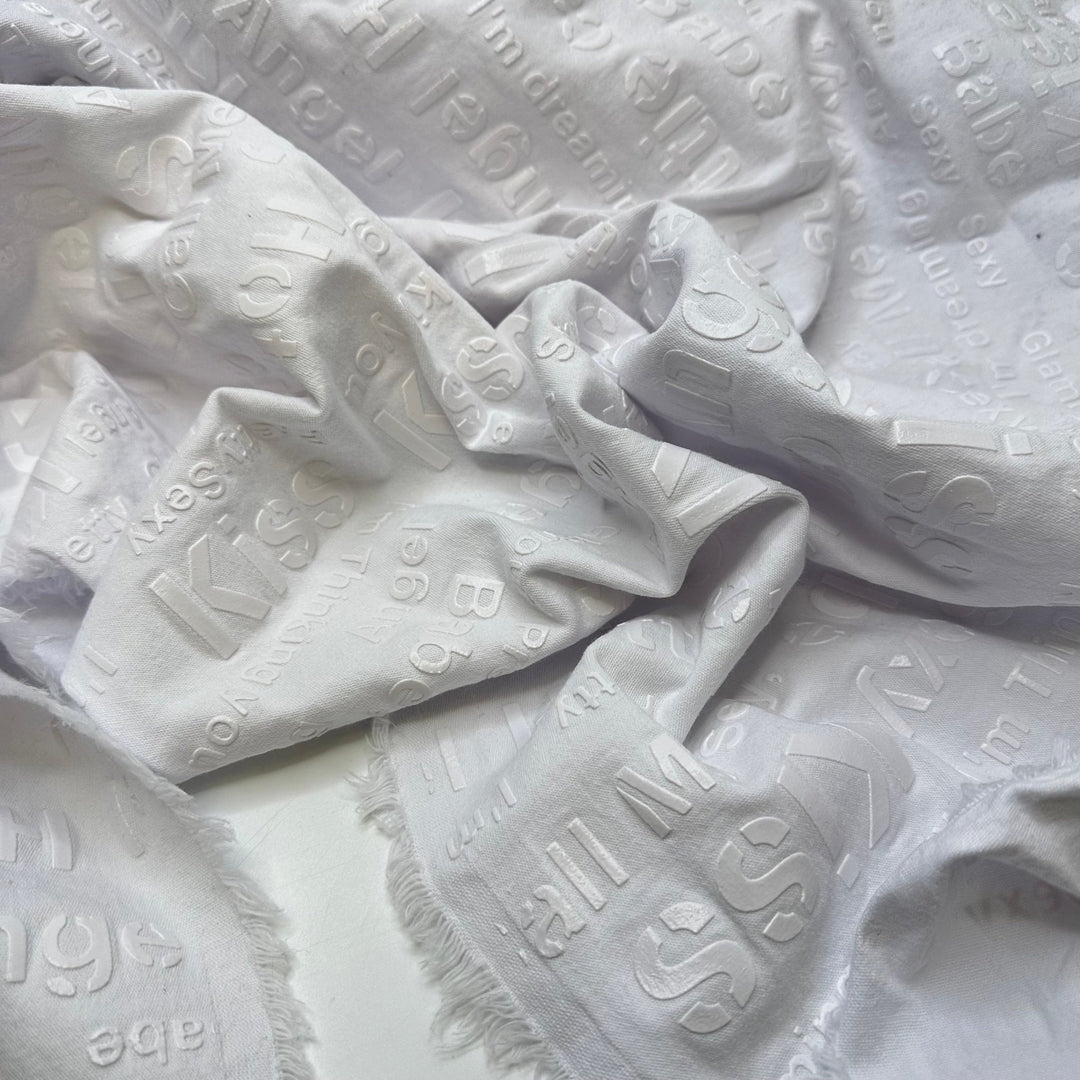 UB - Angel Babe Hottie - Pu Words Pressed On Denim Cotton/PU Woven - White Words - 1.95M Bundle - True Deadstock fabric Fabric by private - Sustainable Textile | FABCYCLE