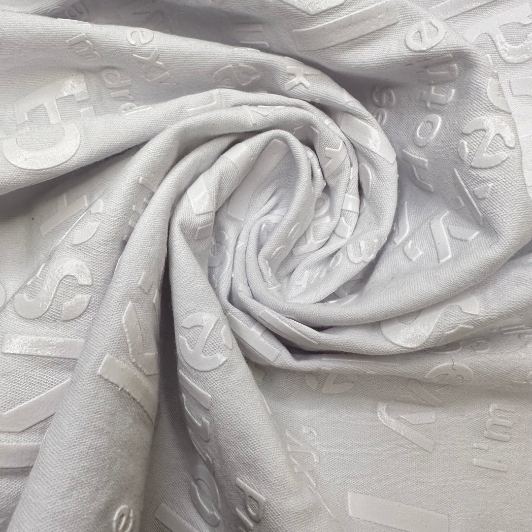 UB - Angel Babe Hottie - Pu Words Pressed On Denim Cotton/PU Woven - White Words - 1.95M Bundle - True Deadstock fabric Fabric by private - Sustainable Textile | FABCYCLE
