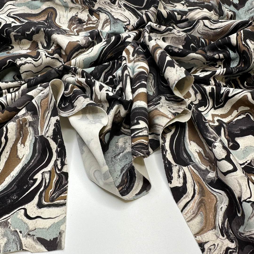 UB - Marbled Art - Jersey Poly/Spandex Knit - Light Gold Blue Blk White Marbled - 0.95M Bundle - True Deadstock fabric Fabric by private - Sustainable Textile | FABCYCLE