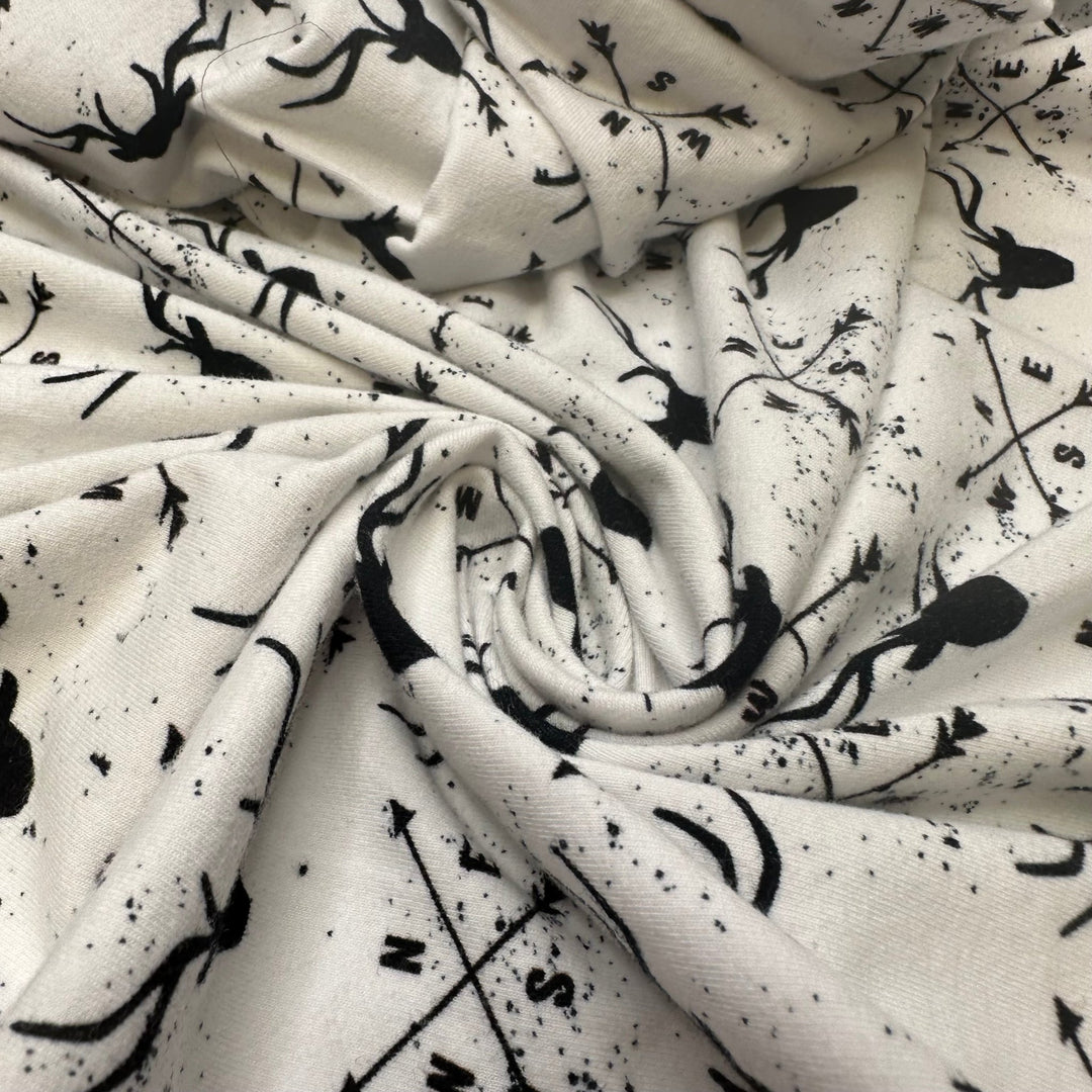 UB - Rudolph Leads The Way - Jersey Cotton Blend Knit - White/Black Reindeer Motif - 1M Bundle - True Deadstock fabric Fabric by private - Sustainable Textile | FABCYCLE