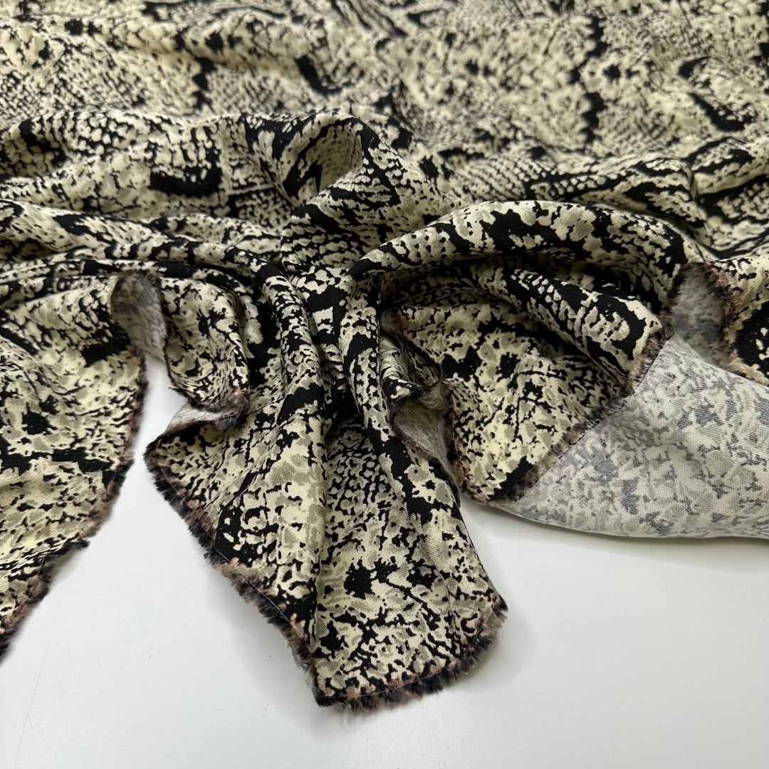 UB - Slither Into My Wardrobe - Rayon Blend Woven - Beige/Black Animal Print - 1.25M Bundle - True Deadstock fabric Fabric by private - Sustainable Textile | FABCYCLE