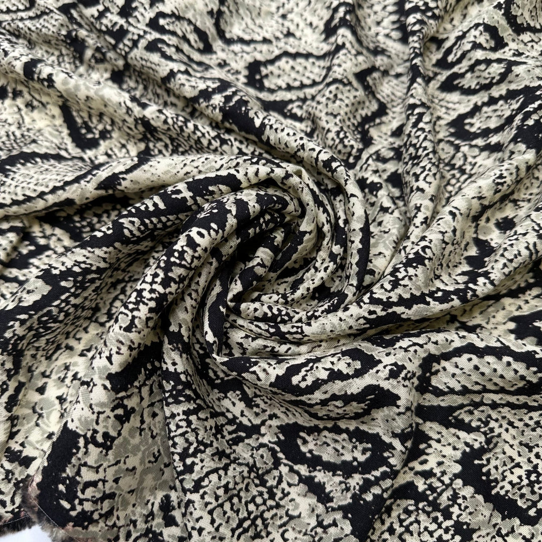 UB - Slither Into My Wardrobe - Rayon Blend Woven - Beige/Black Animal Print - 1.25M Bundle - True Deadstock fabric Fabric by private - Sustainable Textile | FABCYCLE